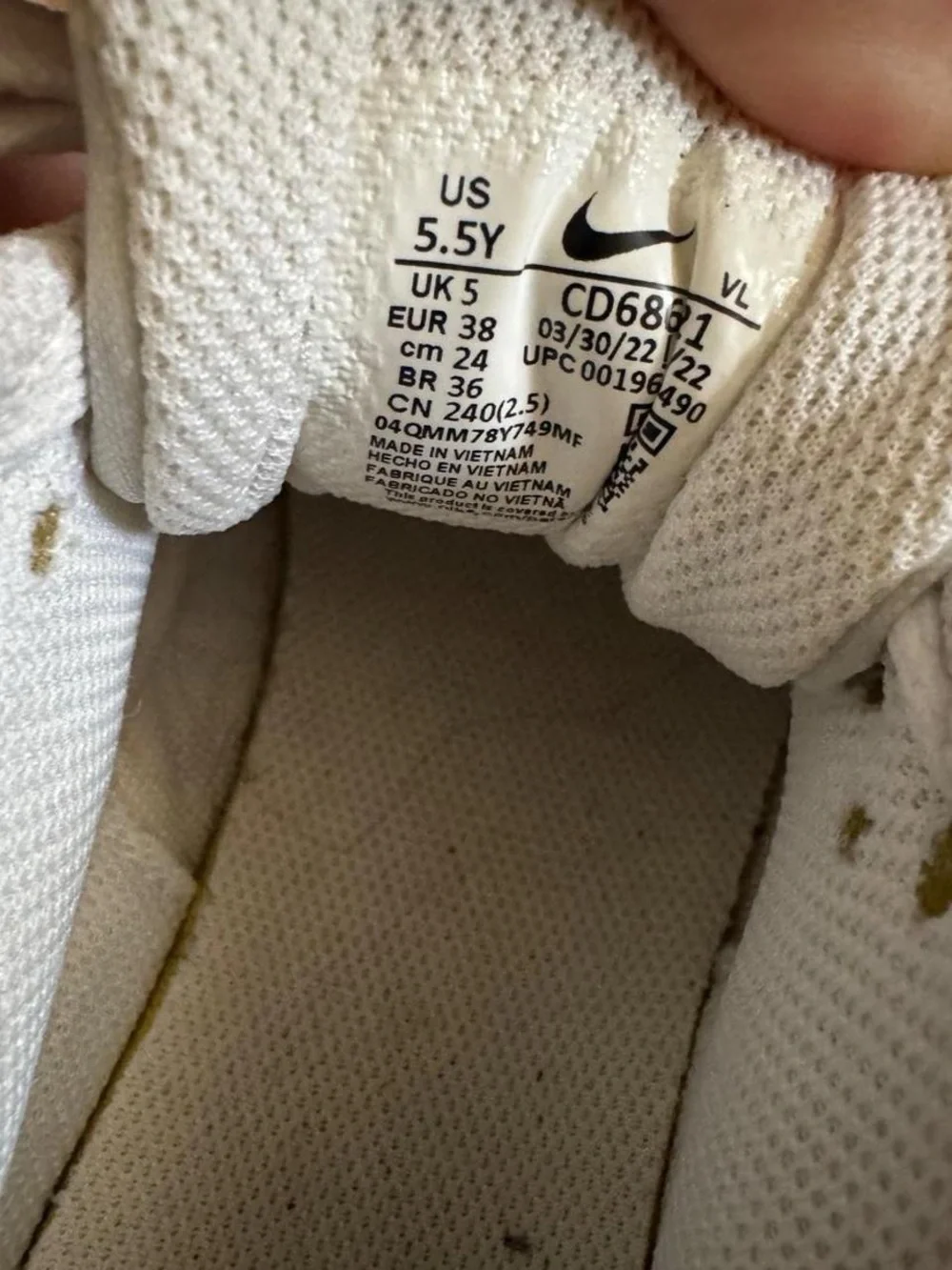 Nike Girl’s White Sneakers with Pink Swoosh Accent